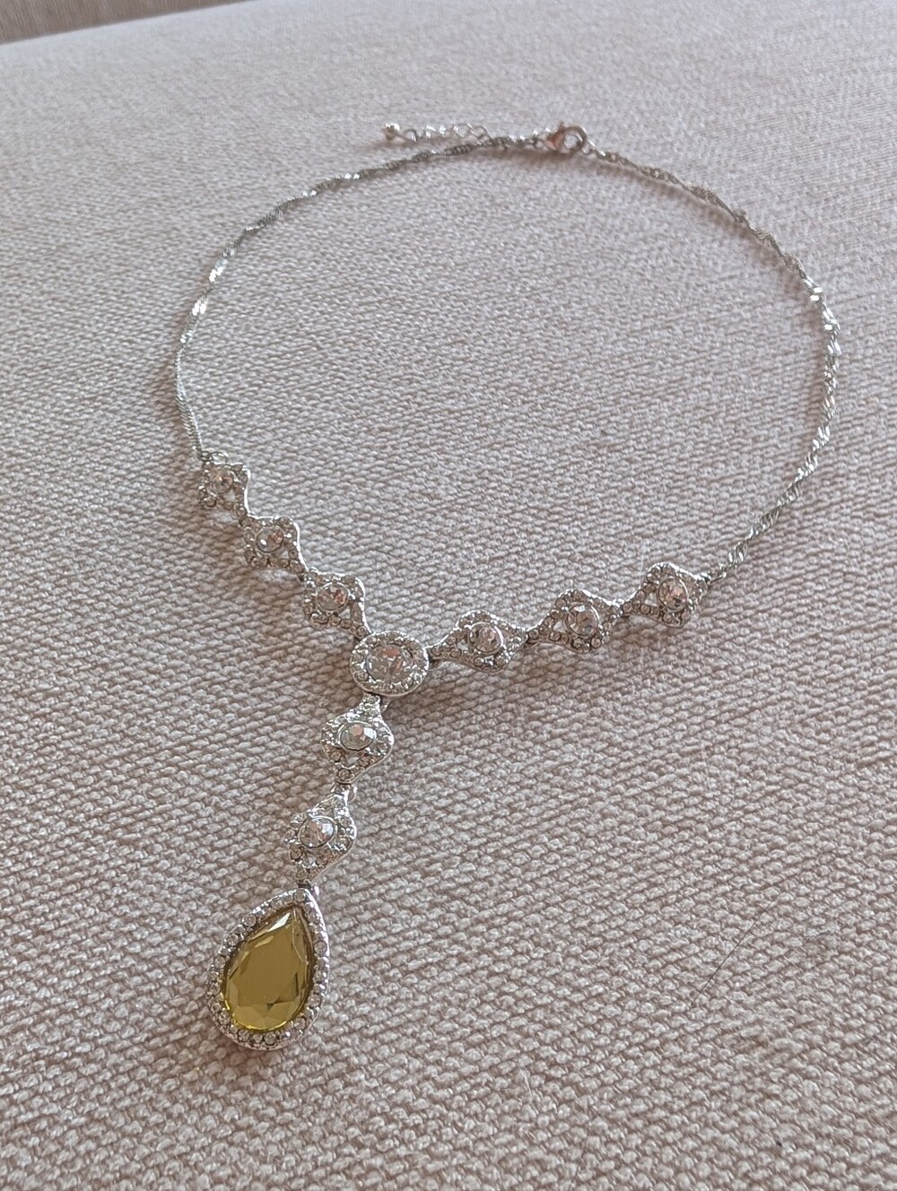 Elegant Silver Necklace with Yellow Teardrop Pendant
